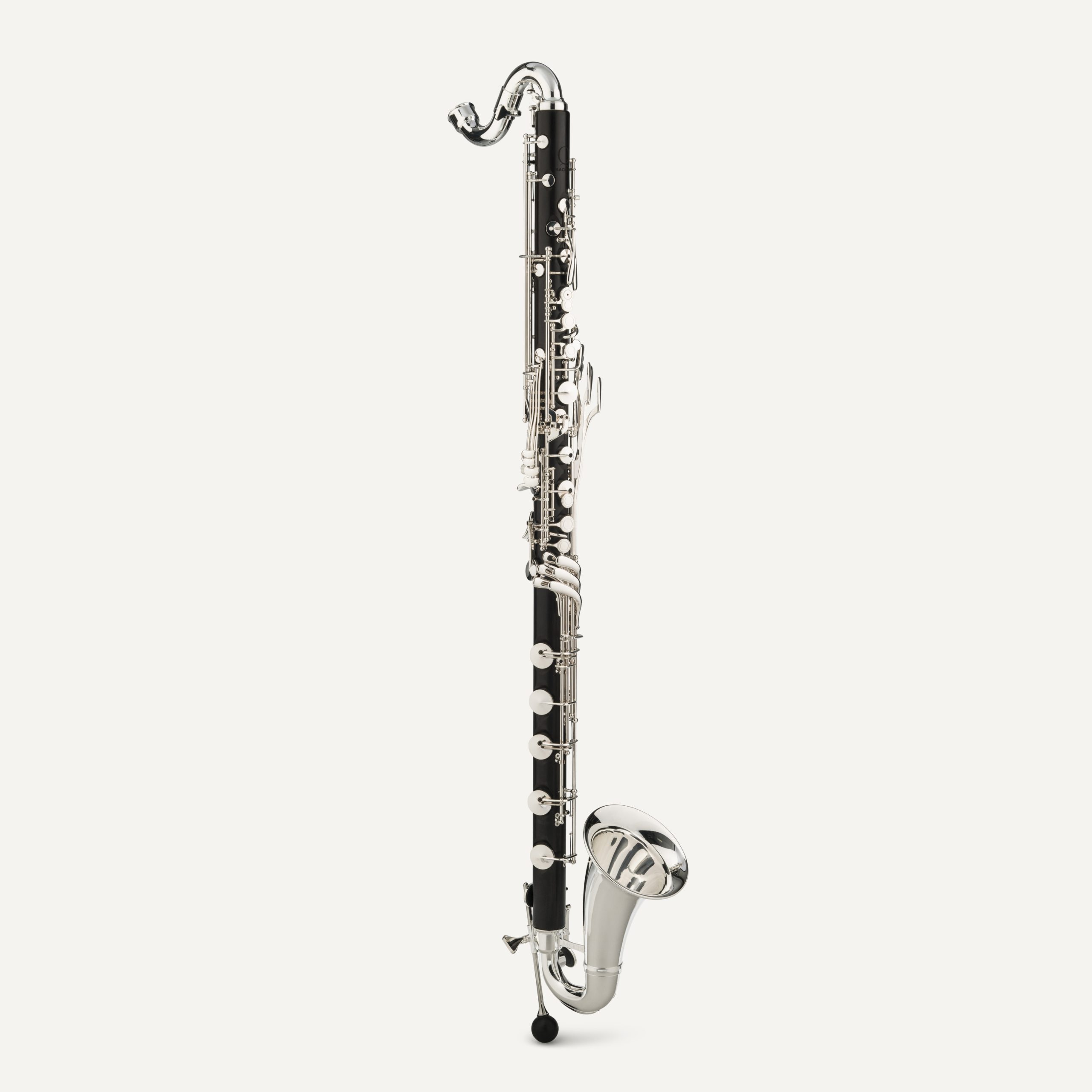 The Backun Q Series Low C Bass Clarinet with silver keys and a curved metal bell stands upright against a plain white background.