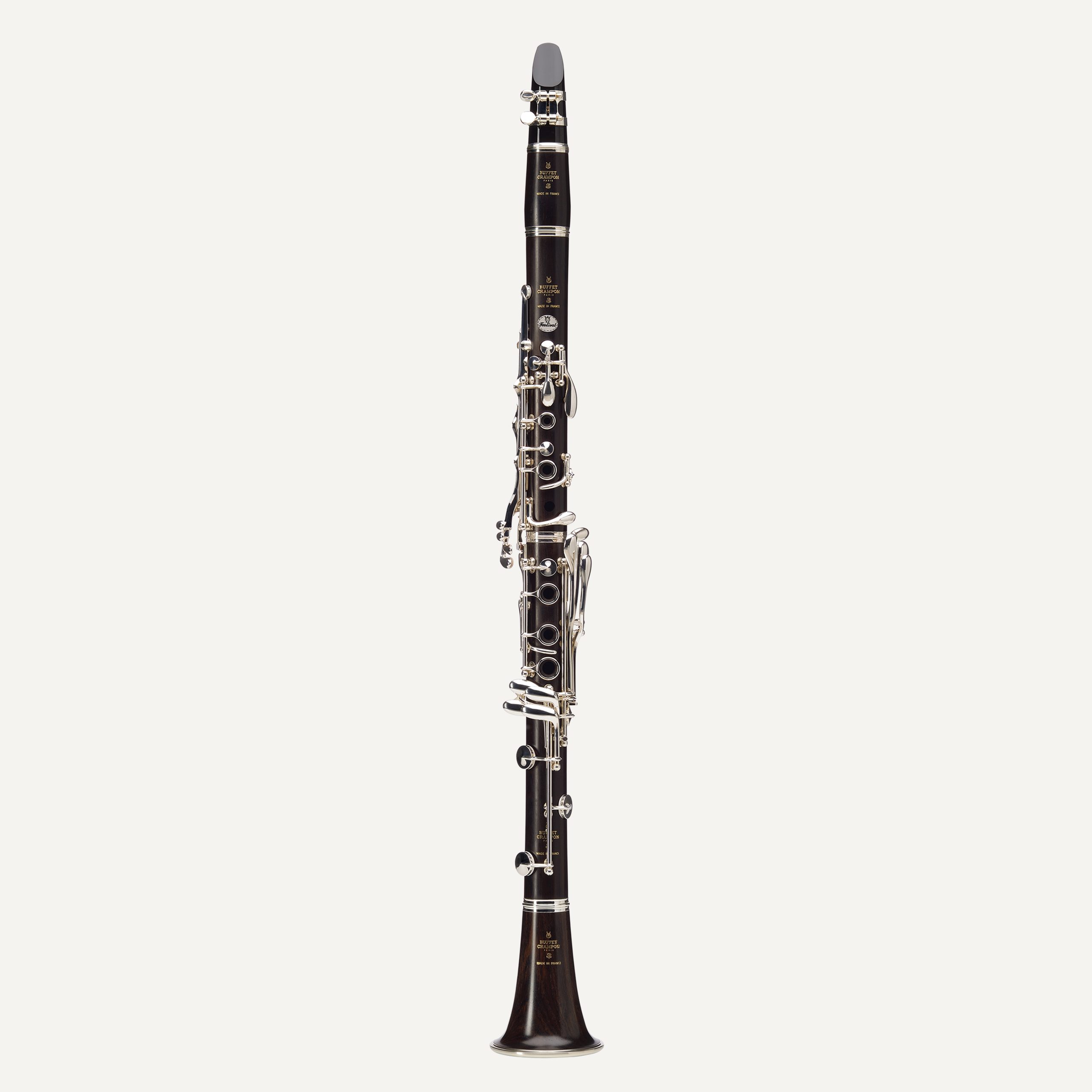 The Buffet Festival A Clarinet, featuring a black body and silver keys, is displayed upright against a plain white background.
