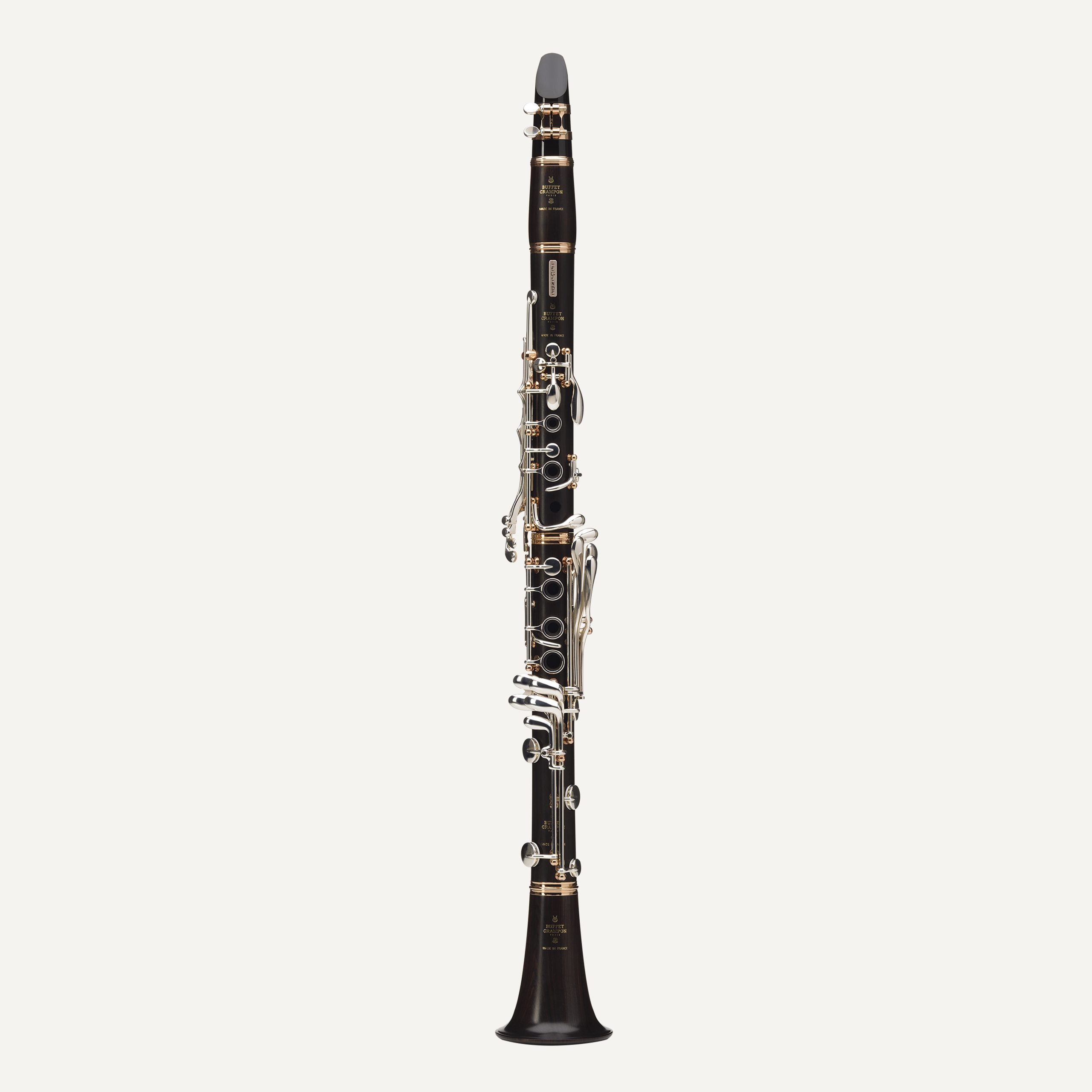 The Buffet Légende A Clarinet, featuring a black body and silver keys, is displayed upright against a plain white background.