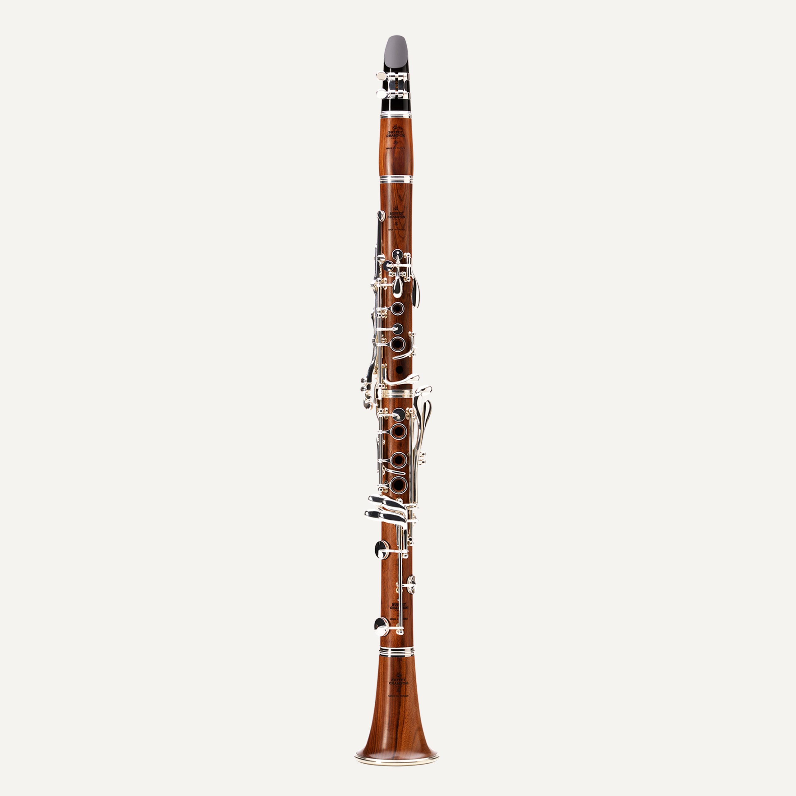The Buffet R13 Mopane Wood A Clarinet, featuring silver keys and a black mouthpiece, is displayed against a plain white background.