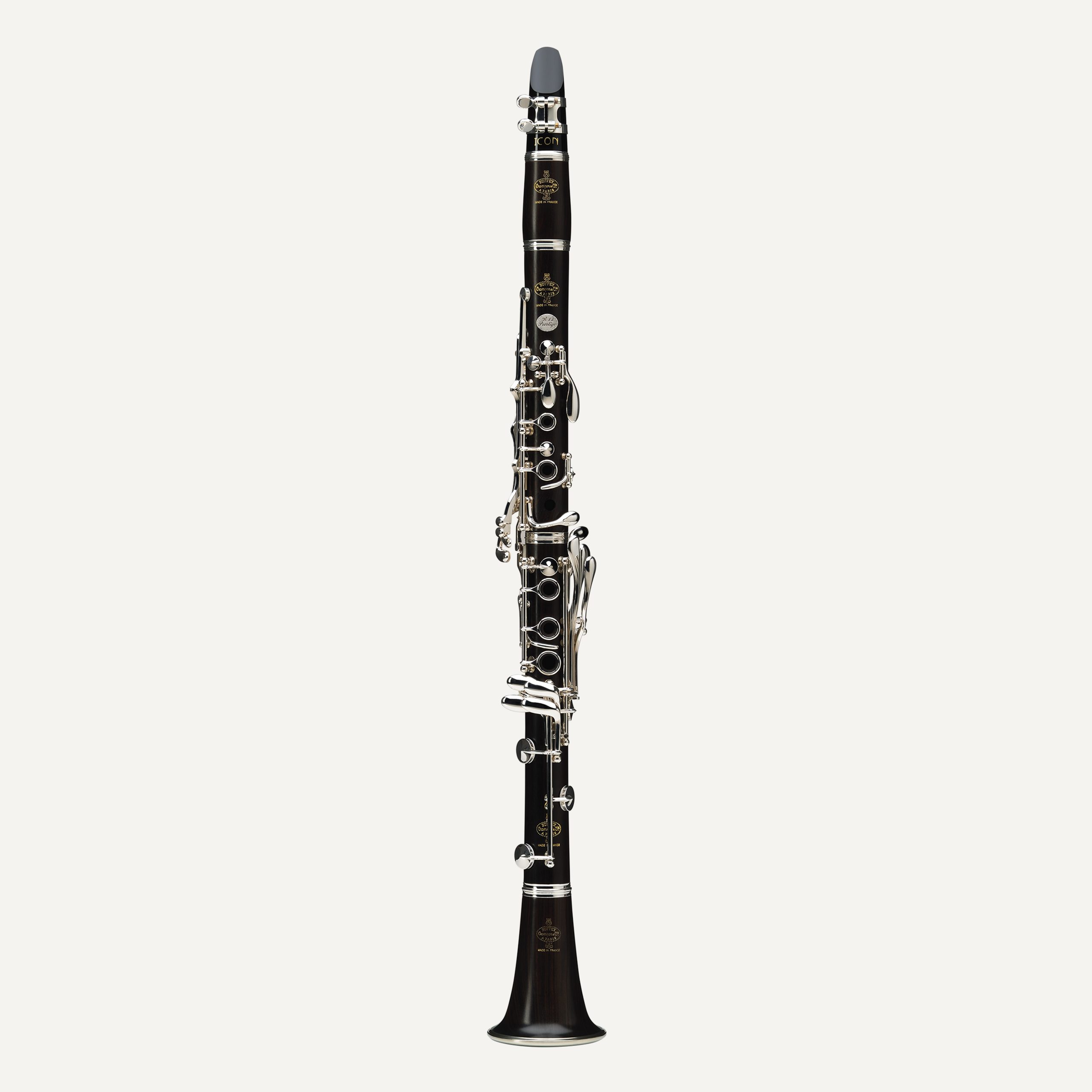 The Buffet R13 Prestige Bb Clarinet, featuring a black body and silver keys, is displayed upright against a plain white background.