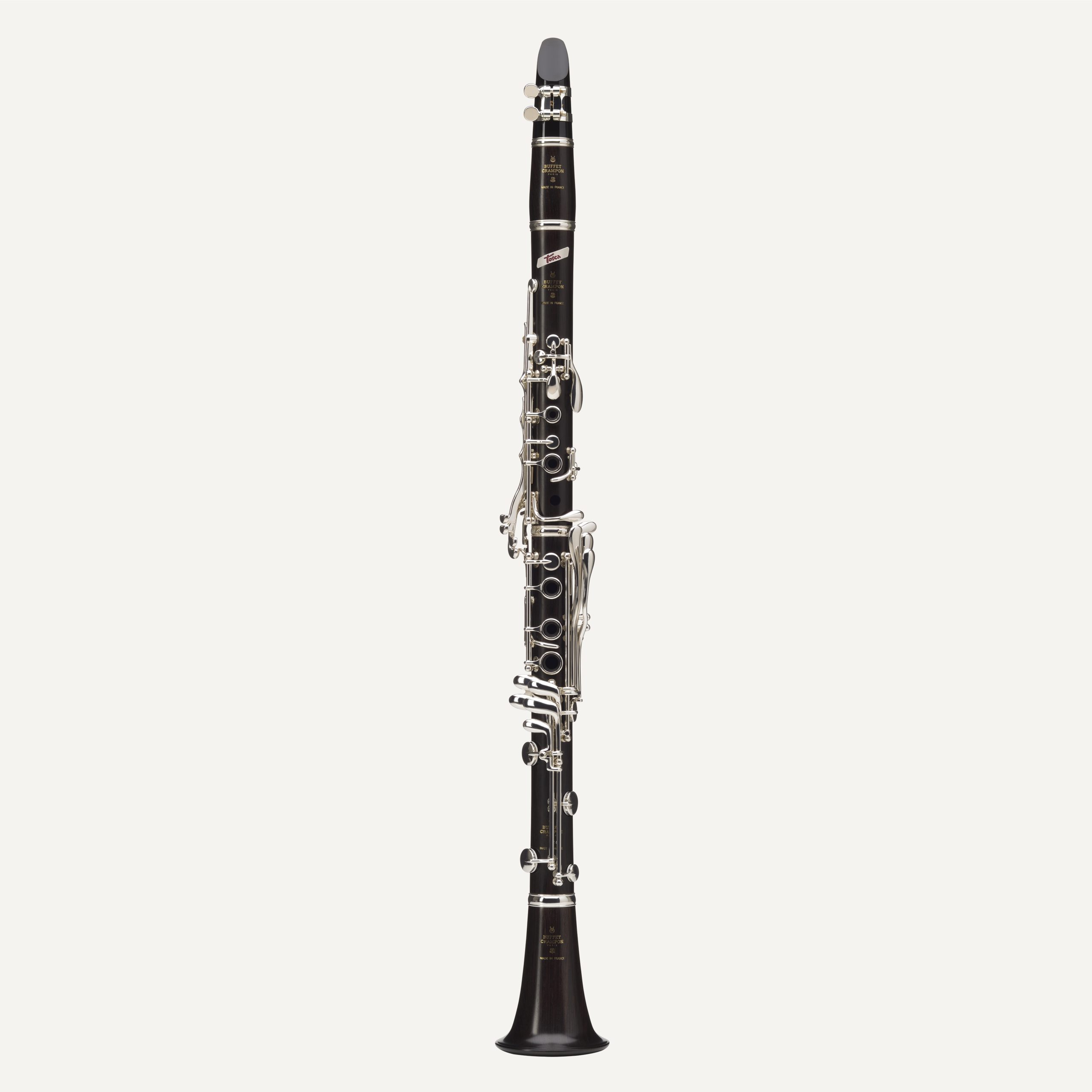 The Buffet Tosca A Clarinet, featuring a black body and silver keys, is standing upright against a plain white background.
