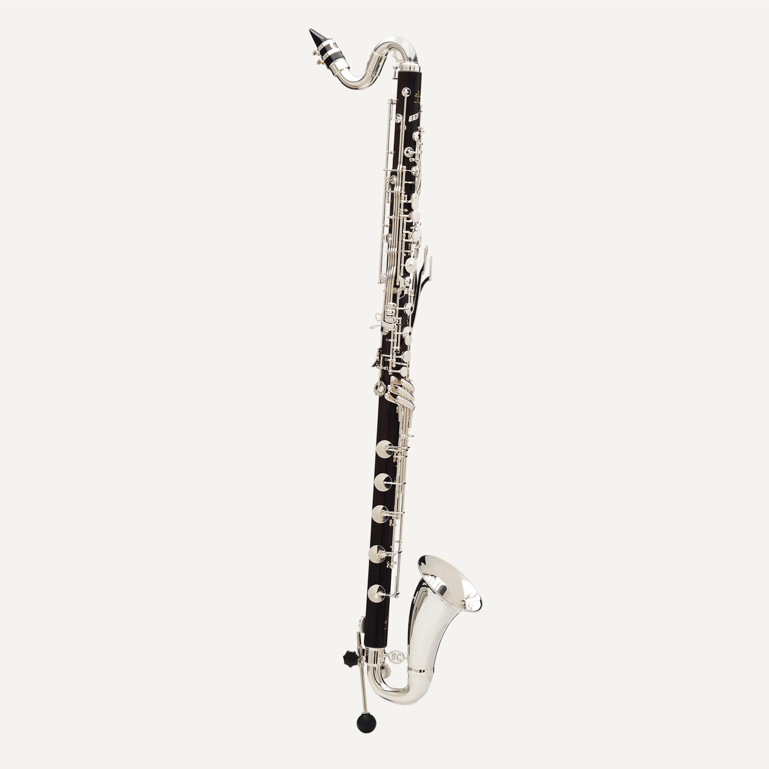 The Buffet Tosca Low C Bass Clarinet features a black body with silver keys, a curved metal bell, and a mouthpiece at the top, shown isolated on a white background.